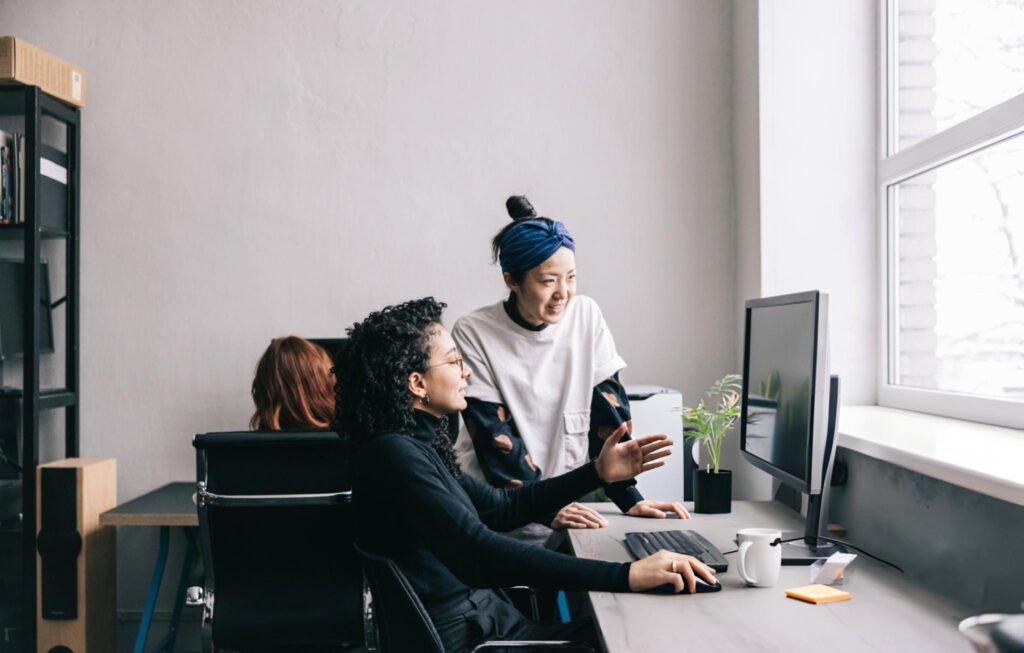 woman helping her colleague