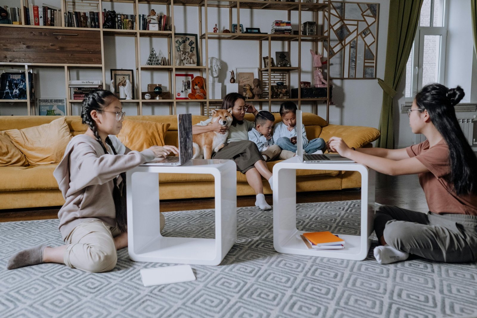 Family members using multiple connected devices on a home WiFi network in Qatar
